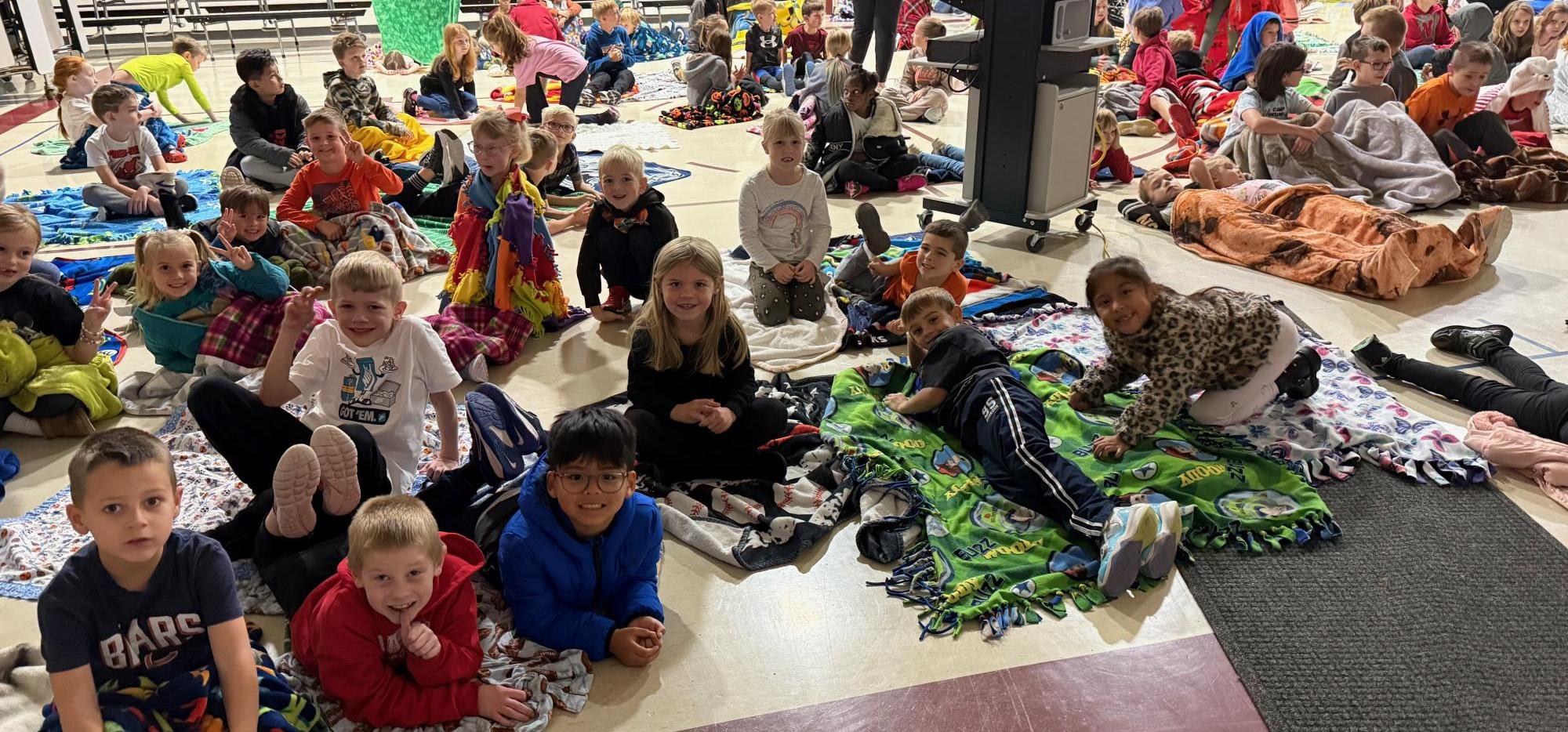 Photo of kindergarten watching a movie